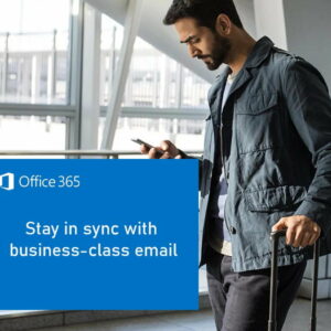 Man in an airport holding a phone